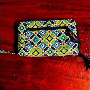 Vera Bradley wallet. Zip around and zipper on side